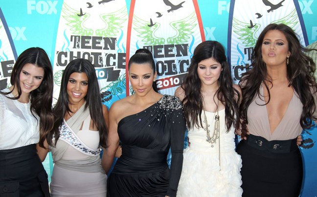 Kourtney Kardashian, gray dress, Kim Kardashian black dress, Khloe Kardashian, tan dress, black skirt